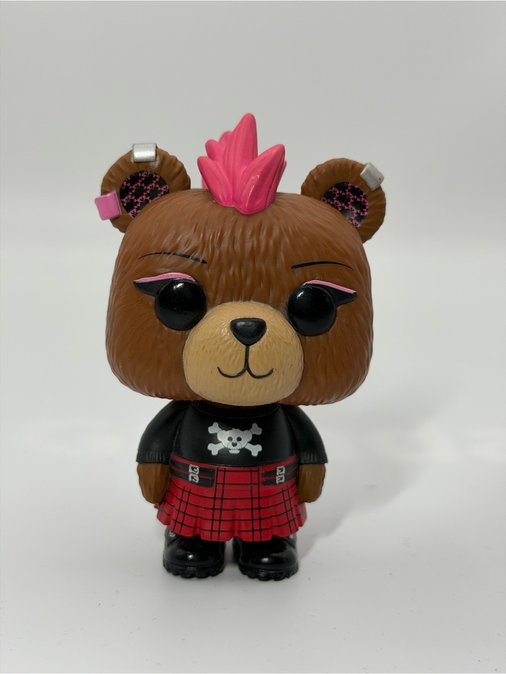 Funko Brown Bear Figure with Pink Mohawk and Red Plaid Skirt